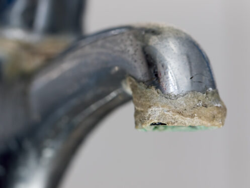 Limescale on the outside of a faucet in Flower Mound, TX