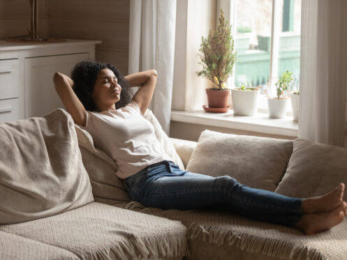 Young woman relaxing in her home in Flower Mound, TX